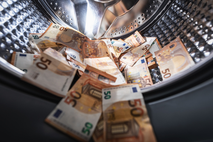 money laundered in a washing machine paper bills euro